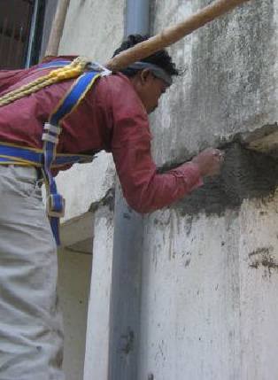 Surface restoration after plaster repair by Rudram Enterprises